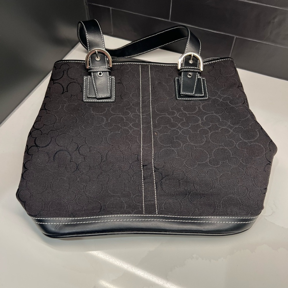 Disney Tote Bag.  Fabric and Leather. Approximately 12”x12”x5” in size.